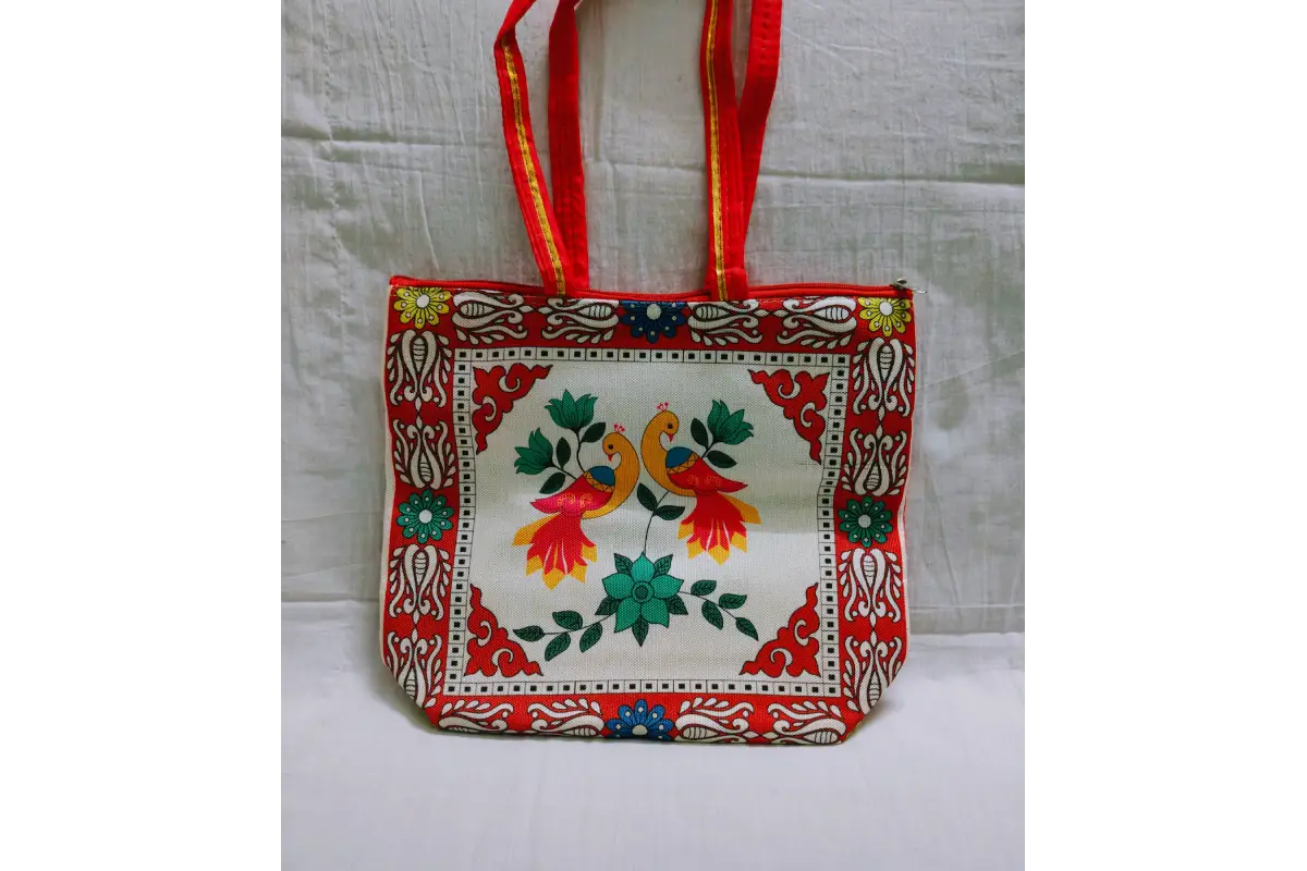Open printed jute handbag showing spacious water-resistant laminated inner lining