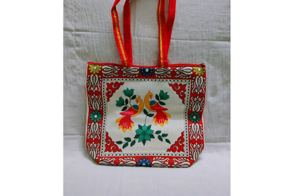 Open printed jute handbag showing spacious water-resistant laminated inner lining