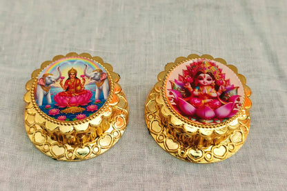 Compact Lakshmi kumkum dabba held in hand showing realistic dimensions for gifting