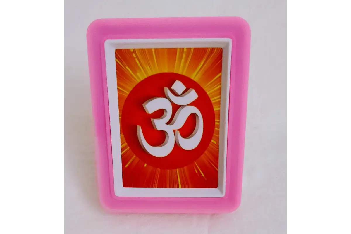 Illuminated 3D divine LED night light placed on pooja room mandir shelf for evening worship