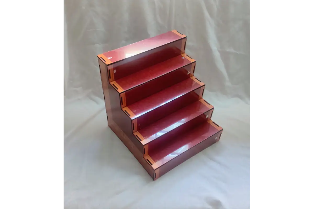 MDF mini Golu stand placed on a wooden mandir shelf decorated for Navaratri Golu