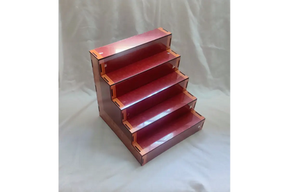 MDF mini Golu stand placed on a wooden mandir shelf decorated for Navaratri Golu