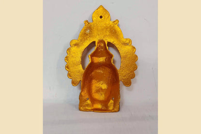 Decorated metal Amman face with an ornate peacock arch - Puja Celebrations