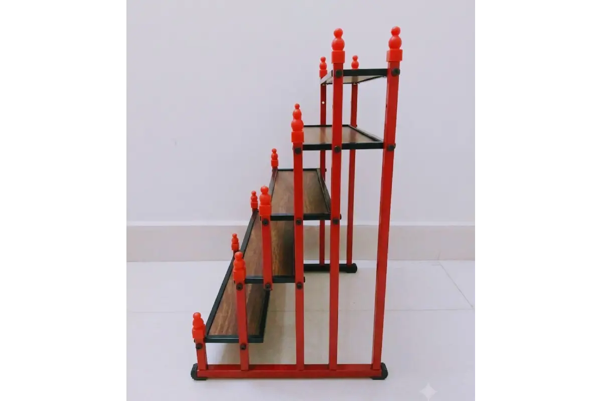 Top angle view of mini Golu stand showing wide step depth for miniature idols