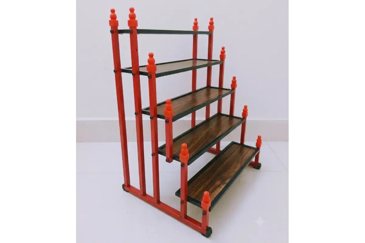 Tabletop mini Golu padi held in hand showing compact dimensions for return gifting