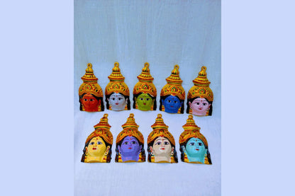 Traditional Durga Devi face mukhavata mounted on a sacred kalash setup for Navratri Ghatasthapana