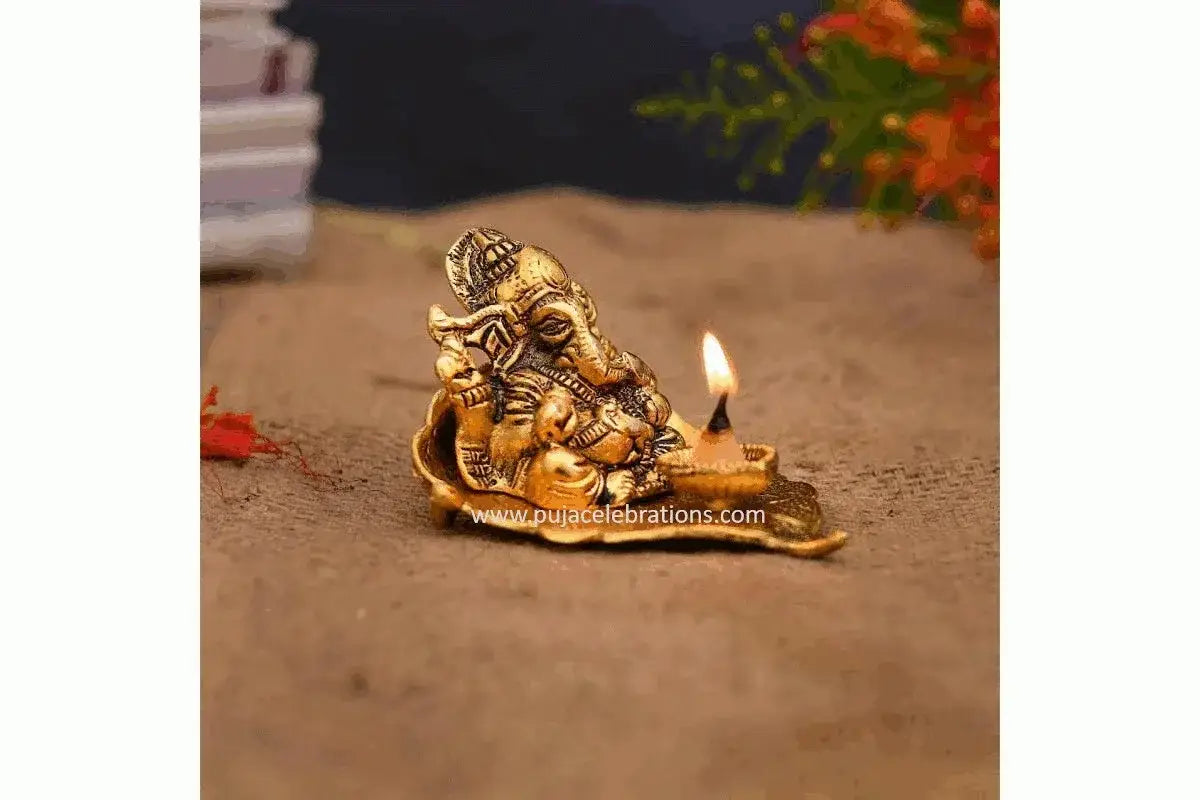 Silver plated Ganesha on Betel Leaf diya