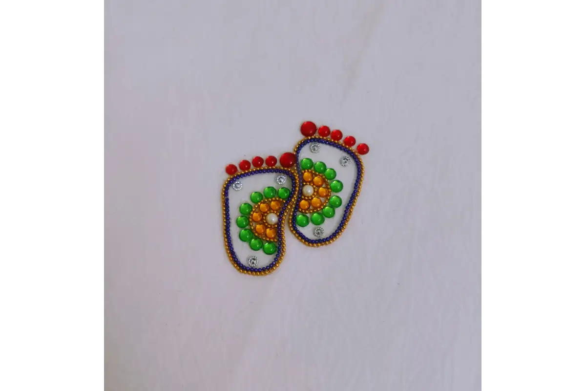 Pair of left and right Krishna Padam rangoli stencils available in  acrylic materials