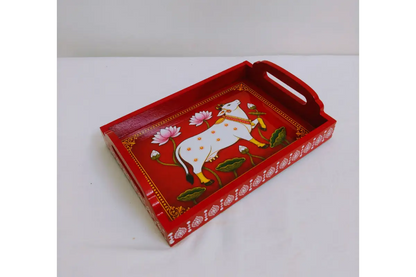 Detail view of sturdy cut-out side handles and raised edges on Pichwai print wooden tray