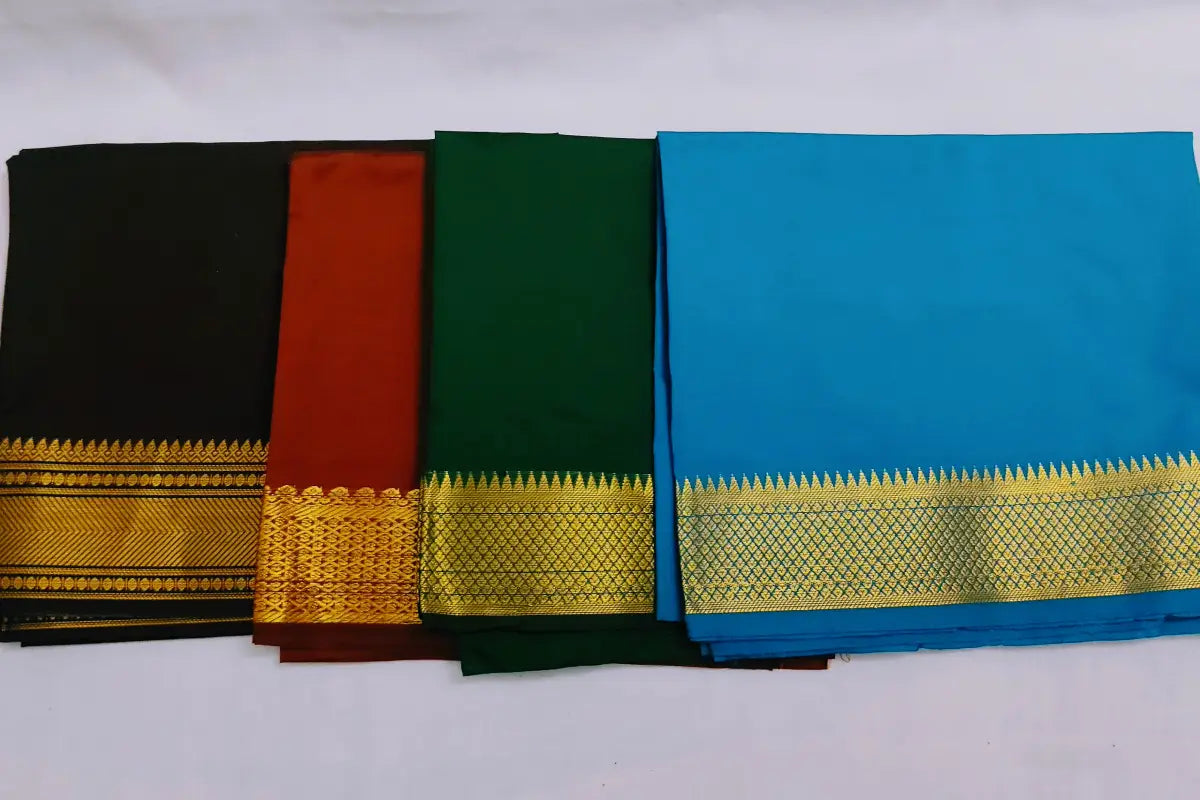 Close-up view of durable polycotton fabric weave and traditional printed pattern on blouse bit