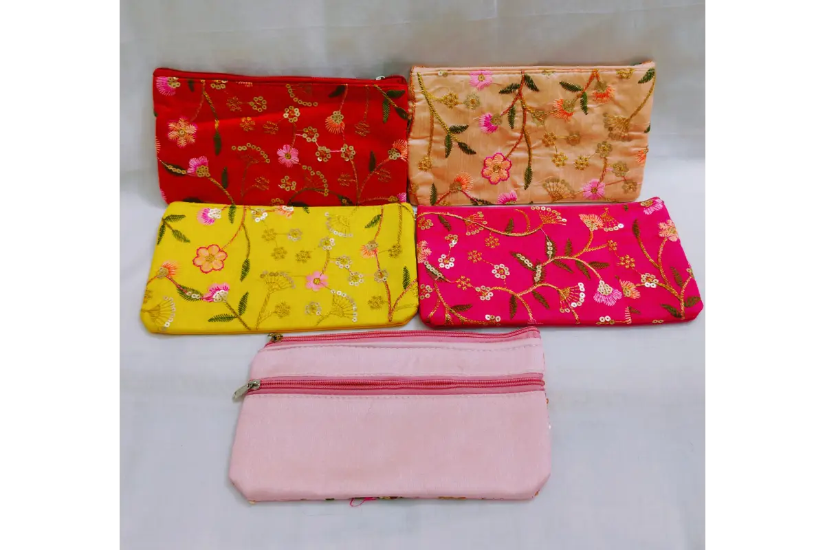 Open printed embroidery purse showing durable zipper closure and fabric inner lining