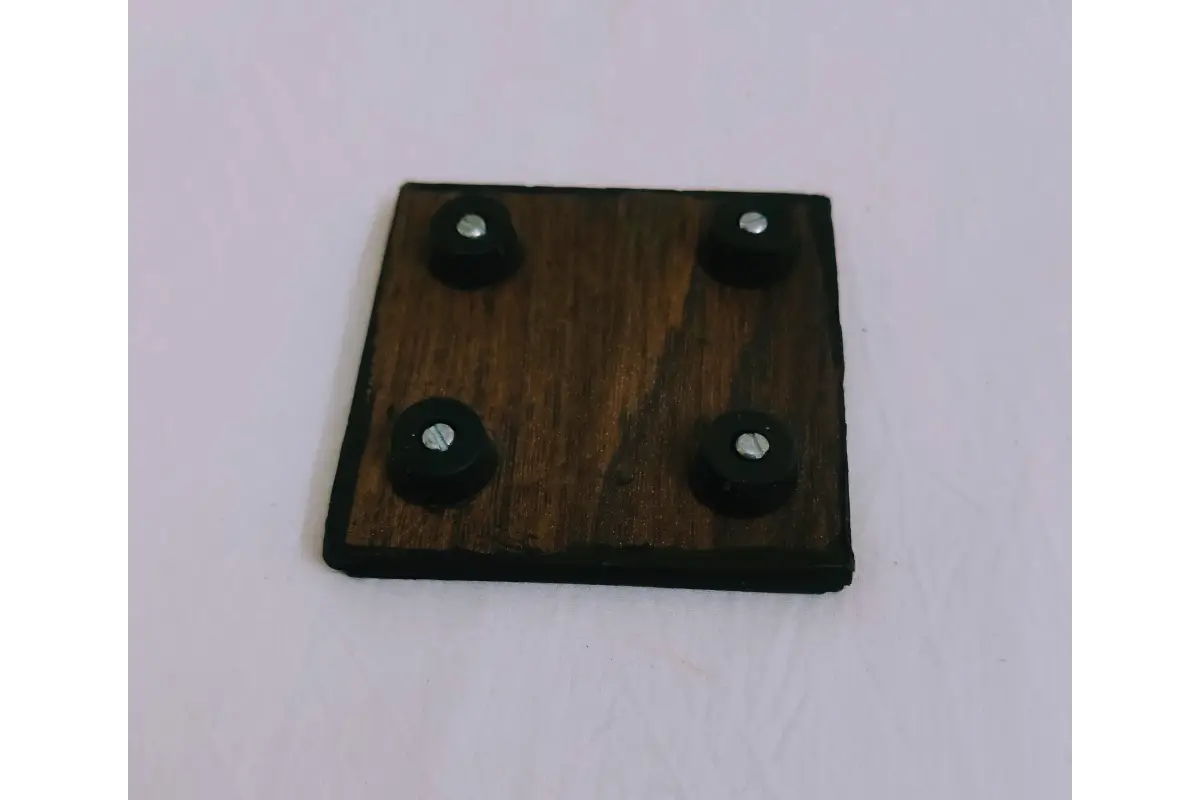 Underside view showing sturdy four-leg support structure of printed wooden pooja patla