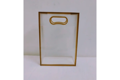 Bottom perspective showing flat wide gusset base of transparent PVC return gift bag