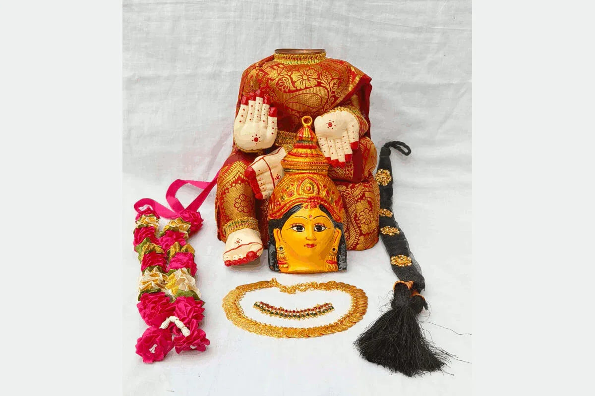 Varamahalakshmi pooja doll decoration kit items including base stand, face idol, and mini kasu mala- Puja Celebrations