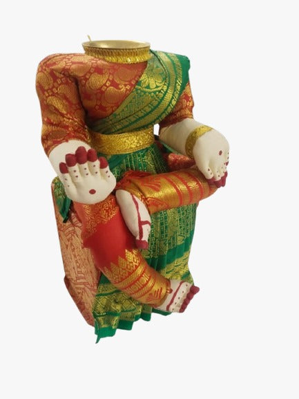 A traditional Indian silk and zari fabric doll or decorative figure