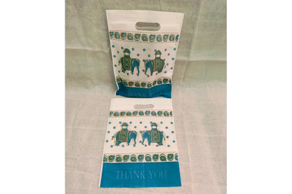 Close-up view of gold foiled Thank You lettering and durable padded handles on Thamboolam bag