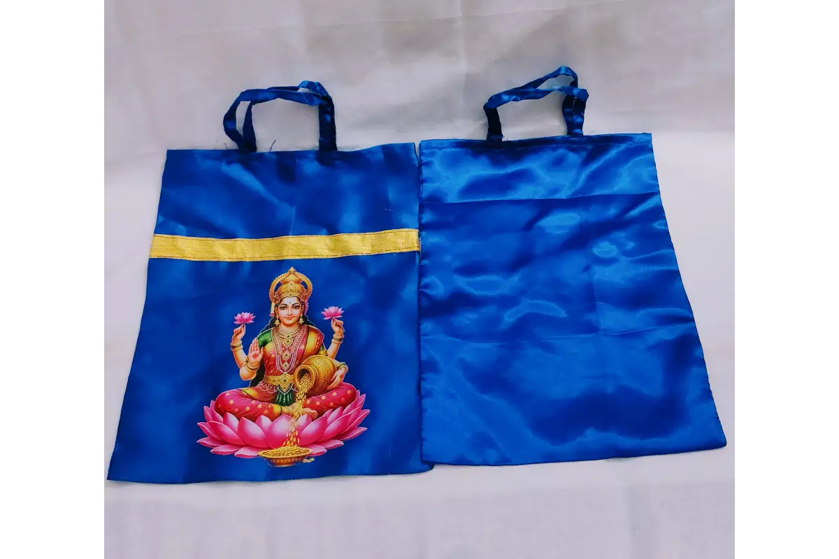 Detail view of sturdy handles and wide side gusset of satin cloth thamboolam pouch