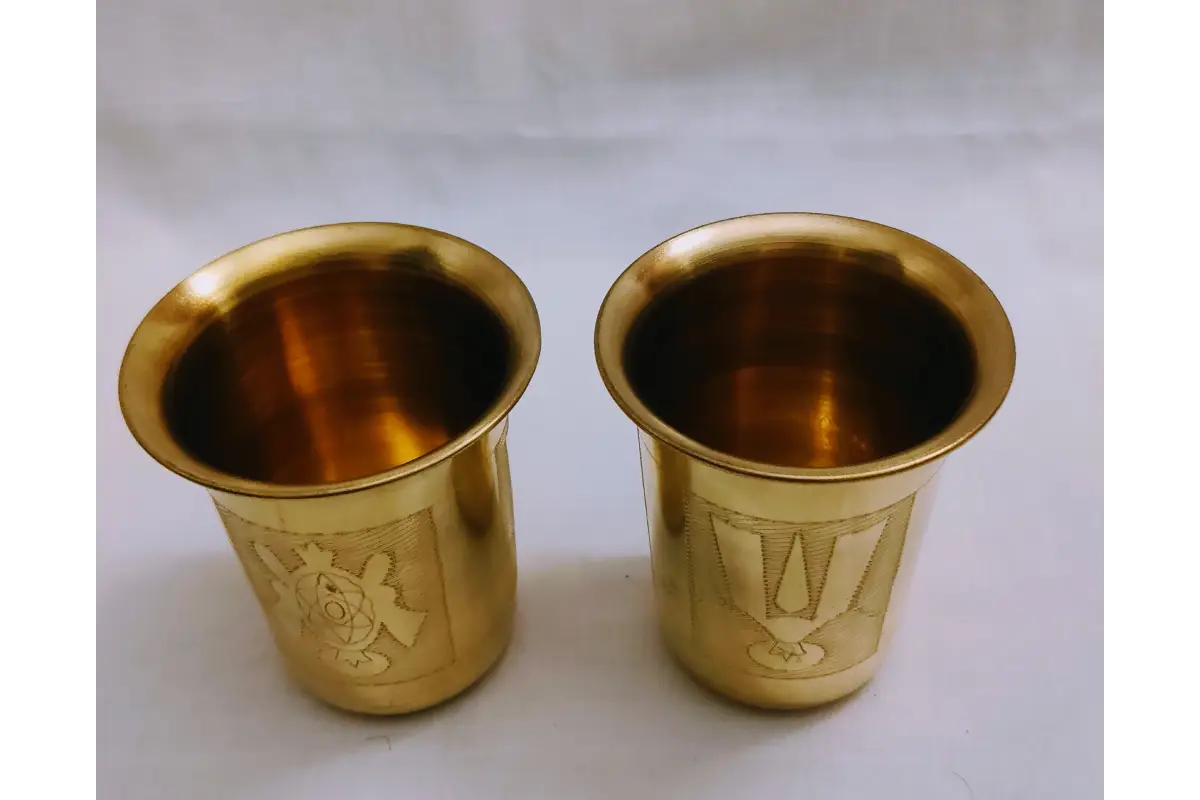Side profile view showing mirror polish sheen and durability of Shanku Chakra Namam tumbler
