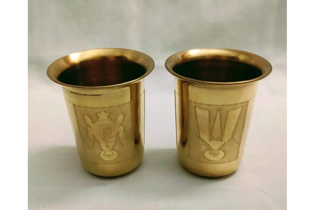 Shanku Chakra Namam glass packed inside return gift box with Haldi Kumkum for guests