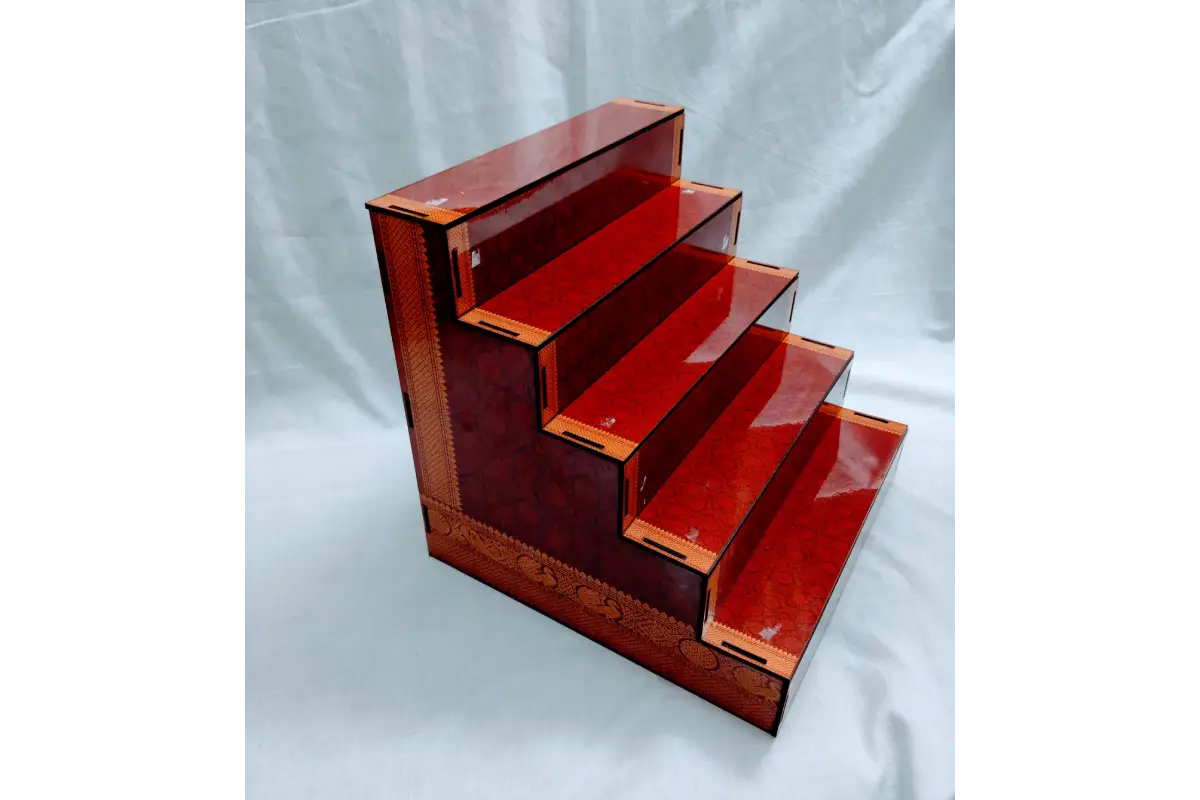 Top angle view of MDF mini Golu stand showing step depth capacity for miniature idols