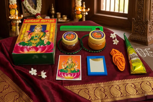 Complete Thamboolam Sumangali set showing Haldi Kumkum pouch blouse piece and pooja accessories - Puja Celebrations