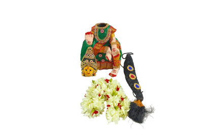 Fully decorated traditional Varalakshmi Devi doll set with a silk saree and Kundan jewelry for festive pooja decor - Puja Celebrations