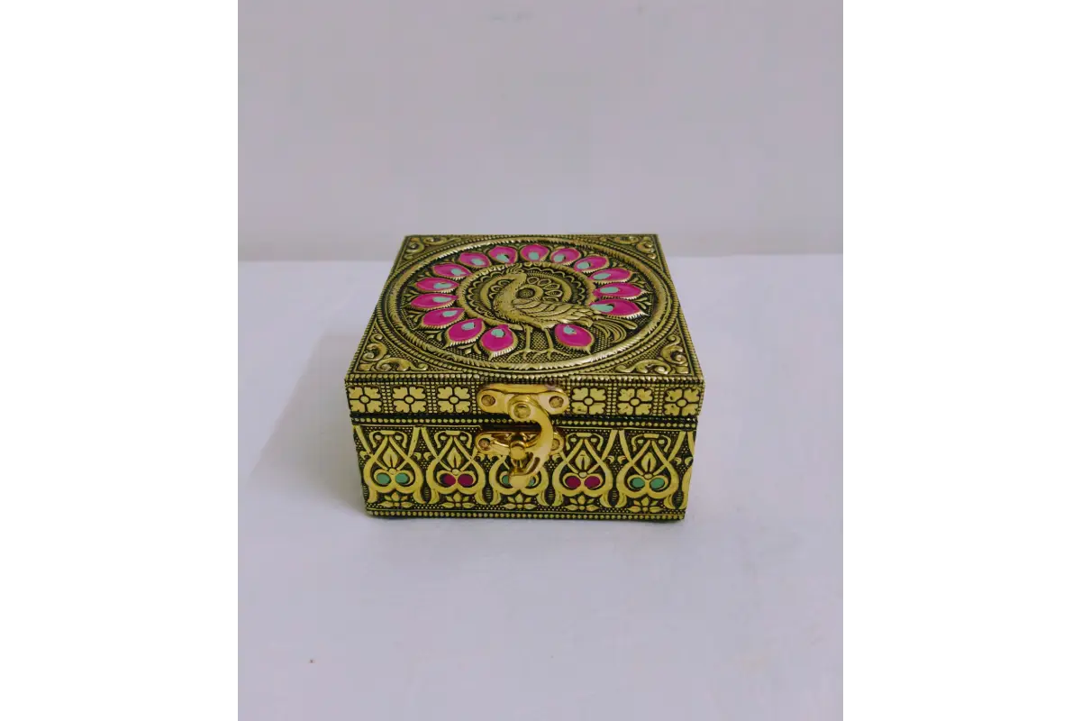 Bulk stacks of royal embossed jewel boxes packed for wholesale return gift orders at Puja Celebrations