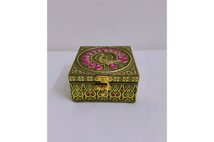 Bulk stacks of royal embossed jewel boxes packed for wholesale return gift orders at Puja Celebrations
