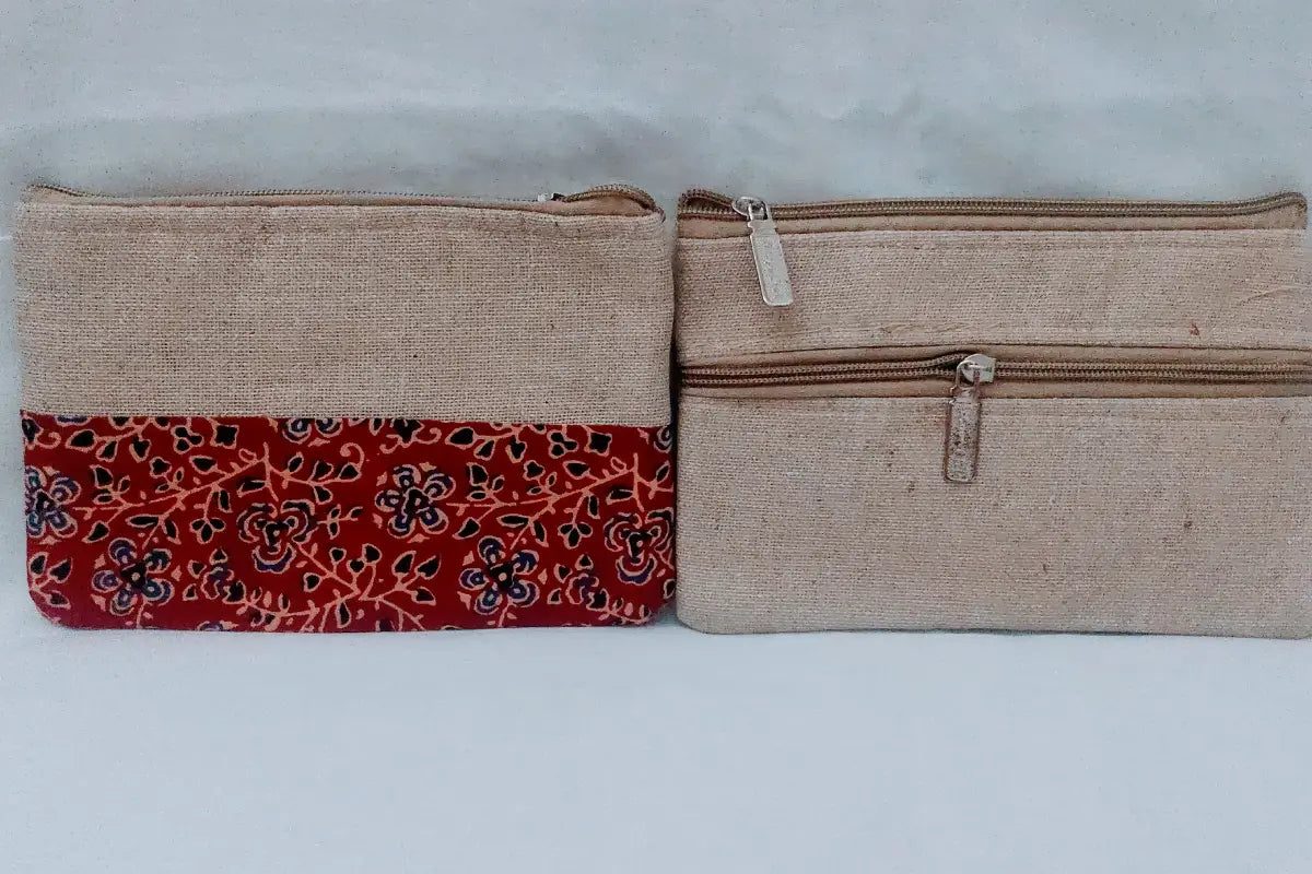 Assorted multi-colored Kalamkari printed purses packed for bulk wholesale return gift orders at Puja Celebrations