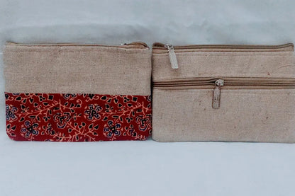 Assorted multi-colored Kalamkari printed purses packed for bulk wholesale return gift orders at Puja Celebrations