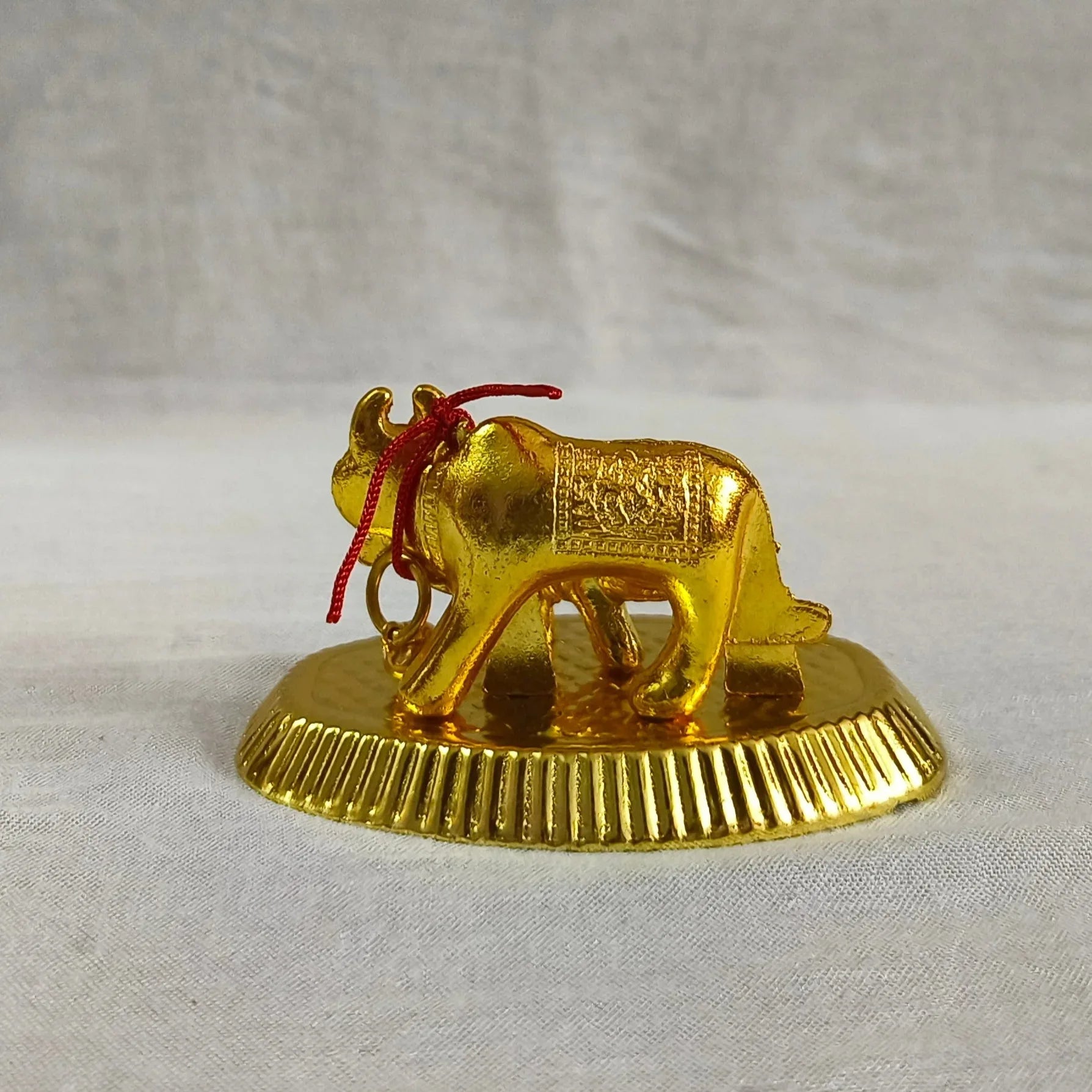 Bulk stock of wholesale Kamdhenu cow and calf idols packaged nicely as wedding return gifts by Puja Celebrations