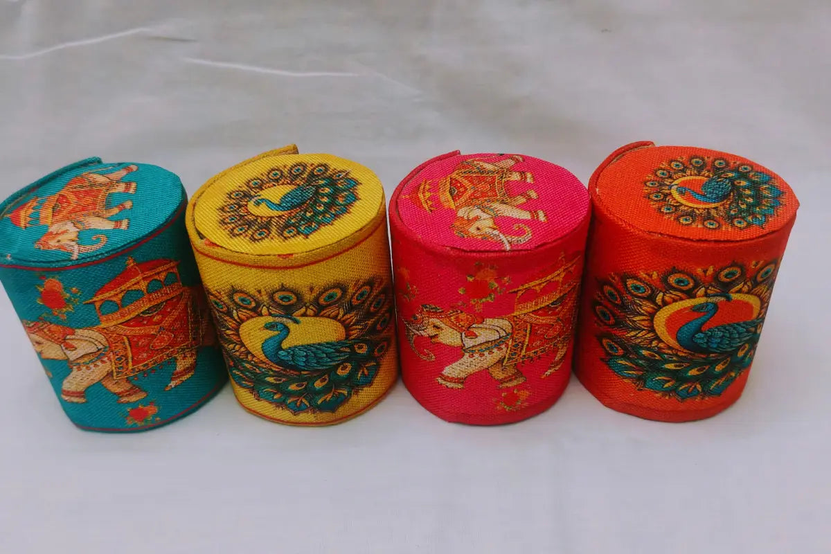 Bulk stack of printed fabric bangle boxes packed for wholesale return gift orders