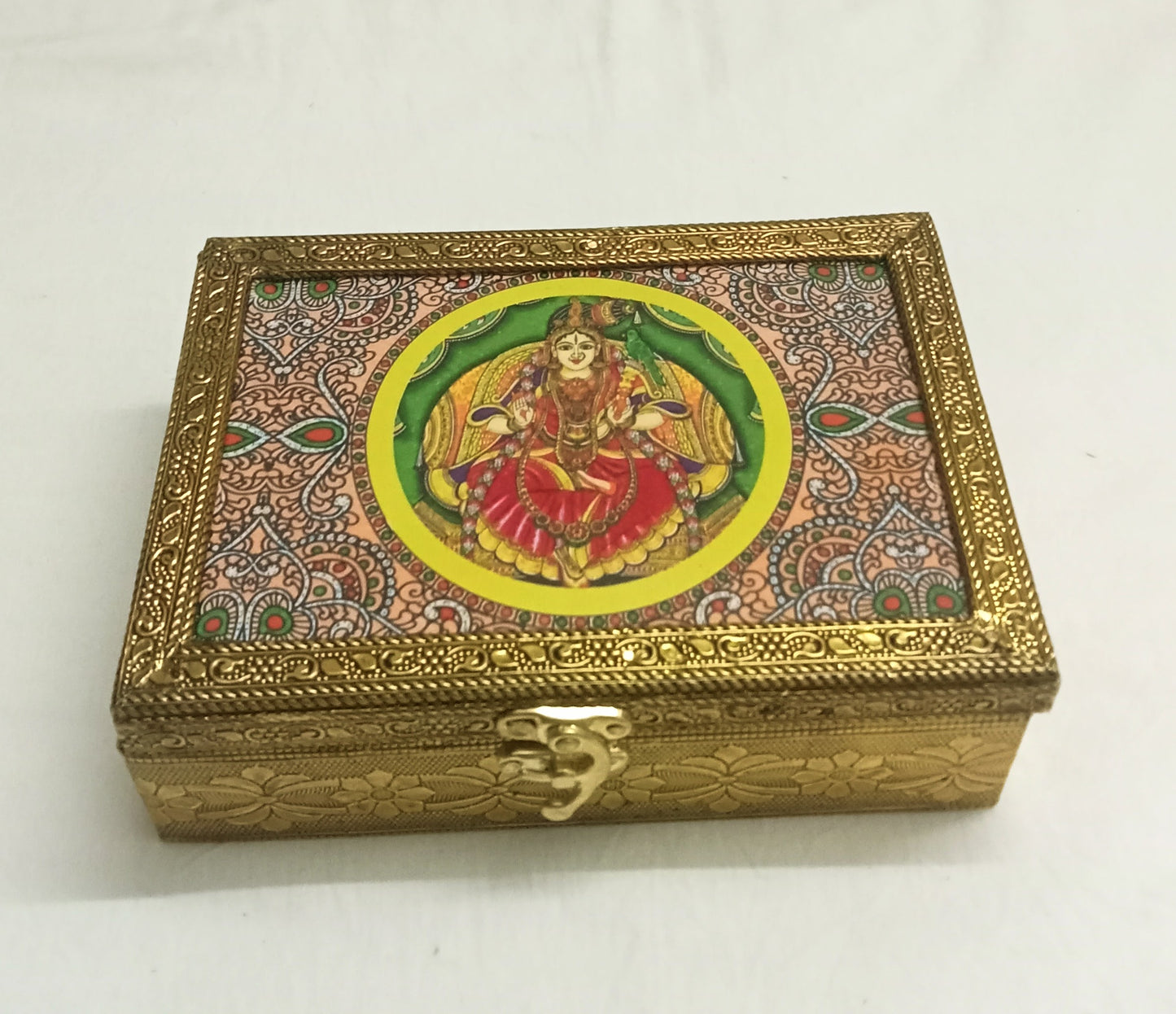 Bulk stock of Tanjore print wooden jewelry boxes packed as traditional return gifts by Puja Celebrations