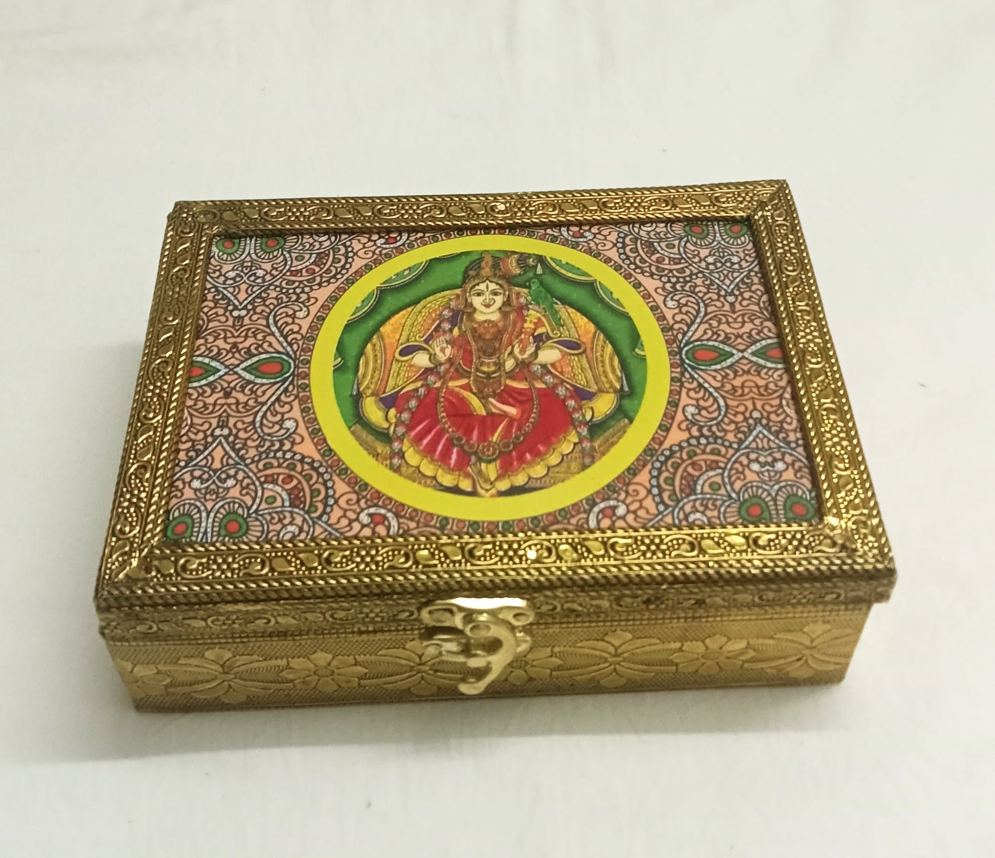 Bulk stock of Tanjore print wooden jewelry boxes packed as traditional return gifts by Puja Celebrations